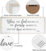 White wooden wall sign with "Bless The Food Before Us" text, in a rustic farmhouse style, 40x11 inches.