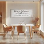White wooden wall sign with "Bless The Food Before Us" text, in a rustic farmhouse style, 40x11 inches.
