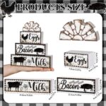 A set of four black and white wooden farmhouse signs, featuring a cow, rooster, and pig, displayed on a tiered tray.