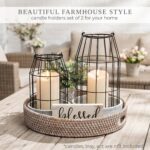 Two KIBAGA rustic farmhouse lanterns, one large and one small, with distressed black and white finishes, on a tabletop.