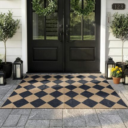 Lahome Black Diamond Checkered Easy Jute 3x5 ft area rug on a porch, showcasing its modern farmhouse pattern.