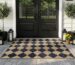 Lahome Black Diamond Checkered Easy Jute 3x5 ft area rug on a porch, showcasing its modern farmhouse pattern.