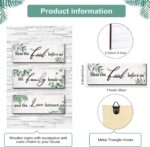 Three Maitys eucalyptus greenery wooden wall signs with 'Bless Family Food Love' text, hung on a rustic wall.