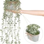 Mkono grey faux eucalyptus plant with long hanging vines in a rectangular galvanized metal pot, displayed on a shelf.