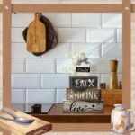 A set of four Moucuny farmhouse-style wooden decorations, including a plate and three blocks with 'eat', 'drink', 'love' in b